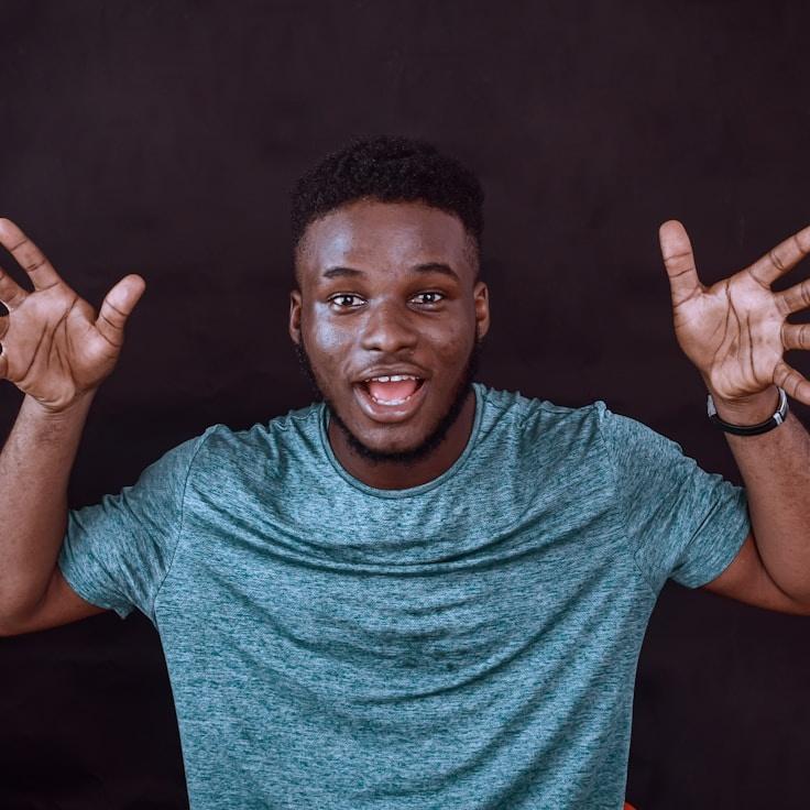 Alex Carter, Lead Design Curator at Tide Brook Crown, reviewing corporate floral arrangements